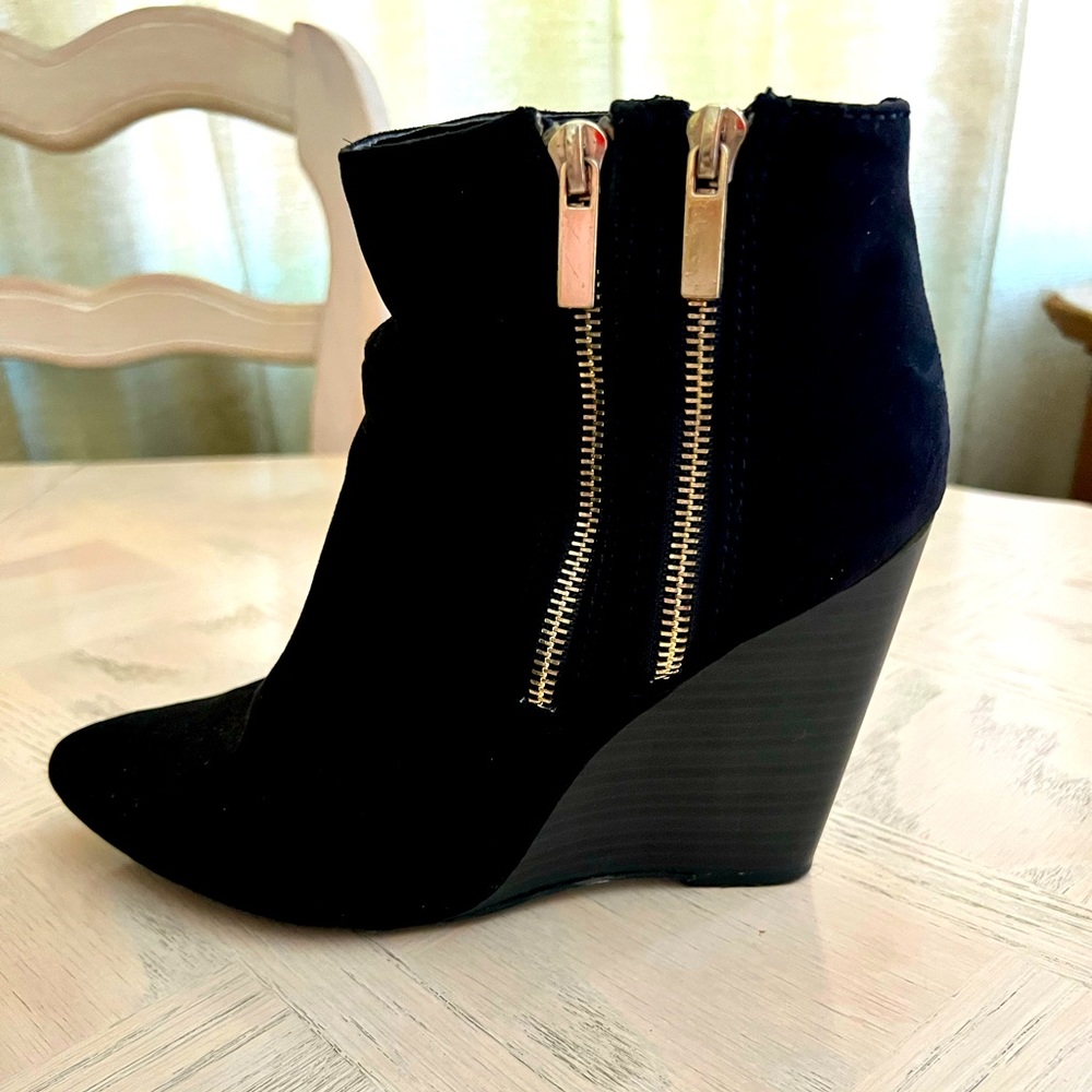 Black wedge zipper booties